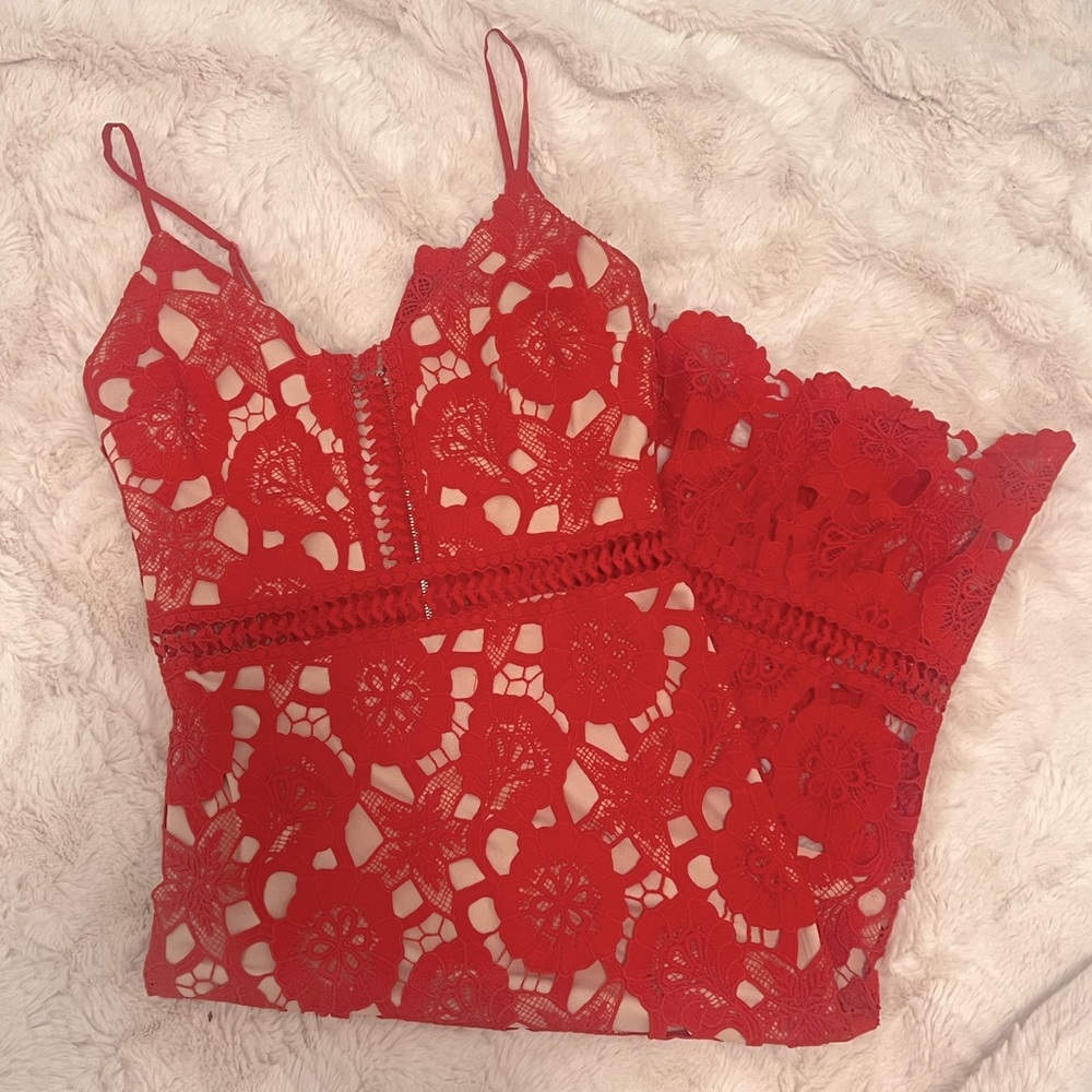 Crocheted strappy red dress with cutouts. Size M